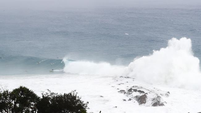 Surfers at Snapper Rocks and Kirra riding the Large swell produced by Cyclone OMA. Photograph : Jason O'Brien