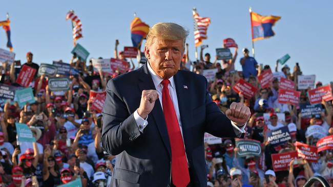 Donald Trump dances at a rally in Tucson, Arizona. Picture: AFP.