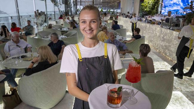 Liliain Houston serves cocktails at the Emporium rooftop bar in Brisbane. Picture: Glenn Hunt