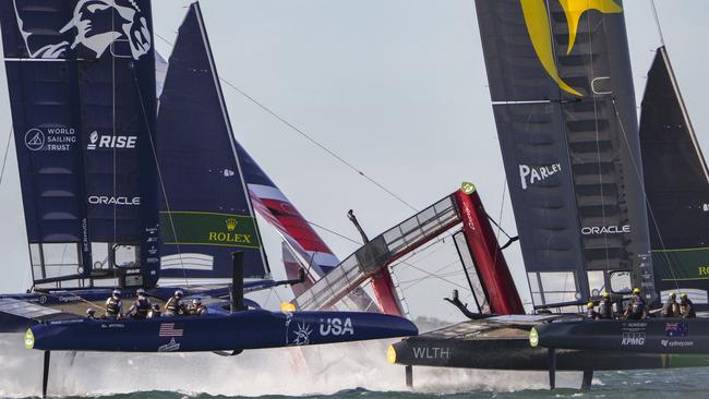 Great Britain SailGP Team helmed by Ben Ainslie capsize during the final race on Race Day 2 at Spain SailGP, Event 6, Season 2 in Cadiz, Andalucia, Spain. 10th October 2021. Photo: Thomas Lovelock for SailGP. Handout image supplied by SailGP