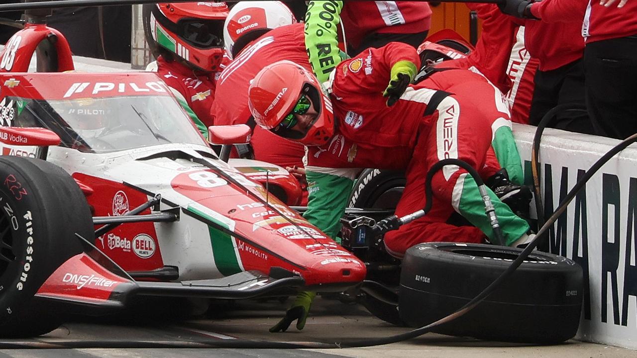 Driver takes out pit crew in ‘scary’ scenes