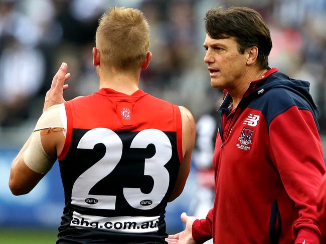 Vince chats with coach Paul Roos. Picture: Wayne Ludbey