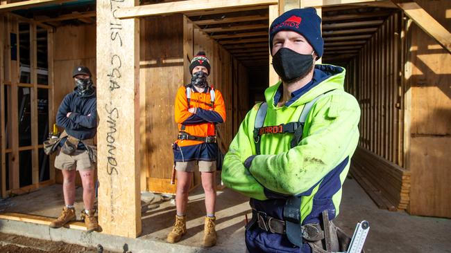 Builders Daniel Billing, Zak Whitnell and Tyler Brindle on site. Picture: Mark Stewart