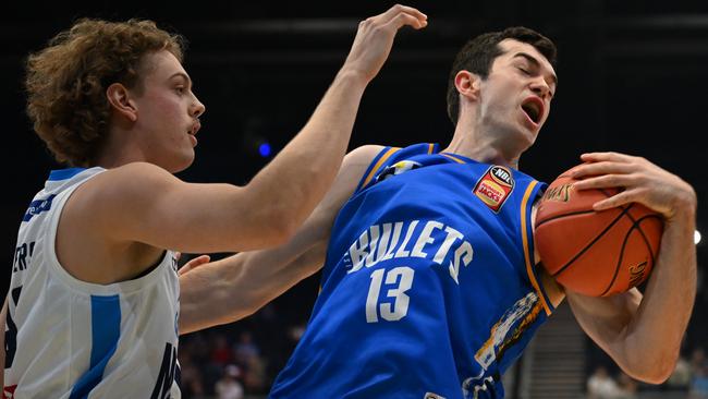 Josh Bannan of the Bullets battles with Melbourne United’s Luke Travers. Picture: Matt Roberts/Getty Images for NBL