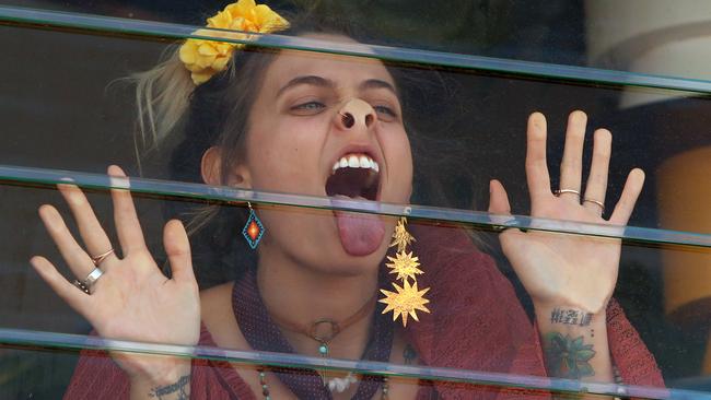 Paris Jackson presses against the window of the Myer Marquee on Melbourne Cup Day 2017.