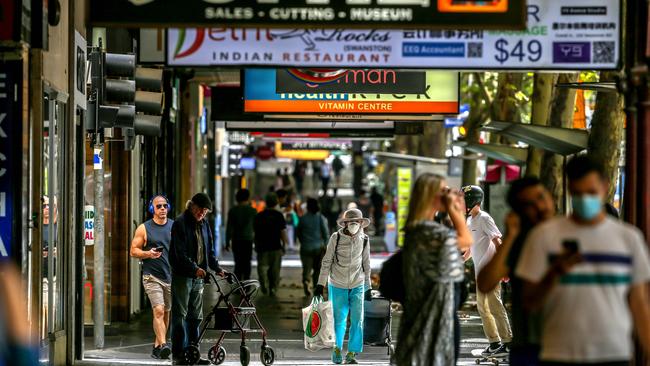 Shoppers in Melbourne’s Swanston Street. Pictures: Tim Carrafa