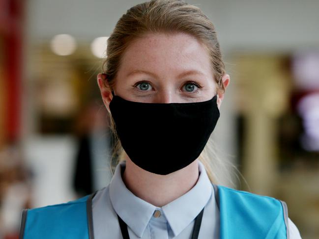 Kitty Ruce, Customer Experience Supervisor is seen wearing a face mask at Broadway Shopping Centre on August 6. Picture: Getty