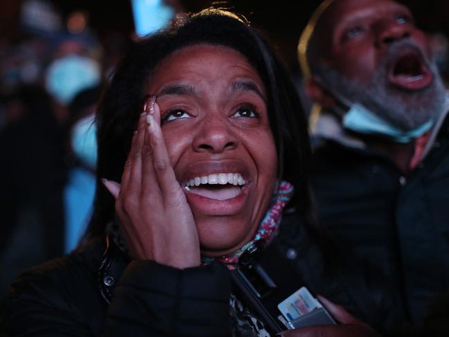 Jailyn Banks celebrates as President-elect Joe Biden arrives on stage at the Chase Centre. Picture: AFP