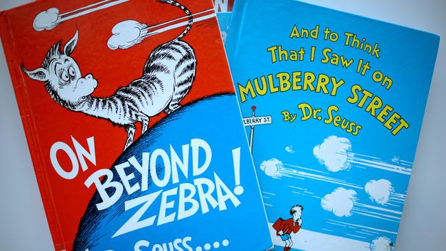 Books by Dr. Seuss, including On Beyond Zebra! and And to Think That I Saw it on Mulberry Street, which will no longer be printed due to accusations of racist and insensitive imagery. Picture: Getty Images