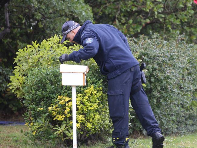 Police at Ms Powell’s home after her death. Picture: John Grainger.