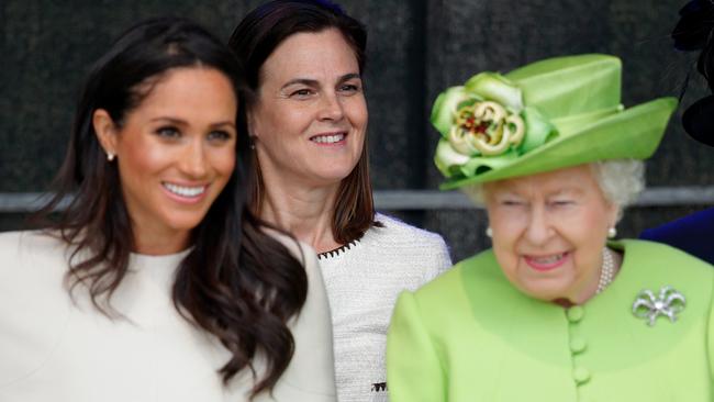 WIDNES, UNITED KINGDOM - JUNE 14: (EMBARGOED FOR PUBLICATION IN UK NEWSPAPERS UNTIL 24 HOURS AFTER CREATE DATE AND TIME) Meghan, Duchess of Sussex and Queen Elizabeth II (accompanied by Samantha Cohen) attend a ceremony to open the new Mersey Gateway Bridge on June 14, 2018 in Widnes, England. Meghan Markle married Prince Harry last month to become The Duchess of Sussex and this is her first engagement with the Queen. During the visit the pair will open a road bridge in Widnes and visit The Storyhouse and Town Hall in Chester. (Photo by Max Mumby/Indigo/Getty Images)