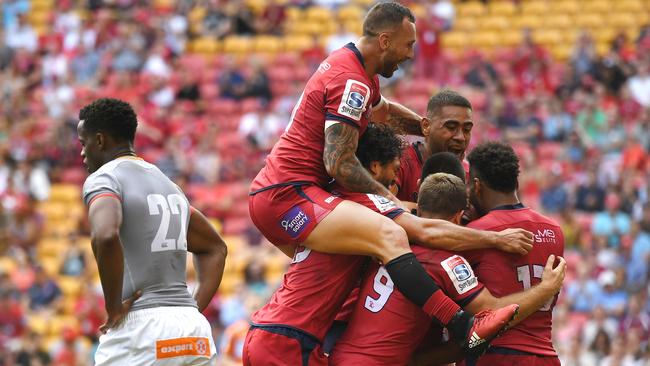 Queensland Reds celebrate after scoring a try during their win over the Southern Kings.