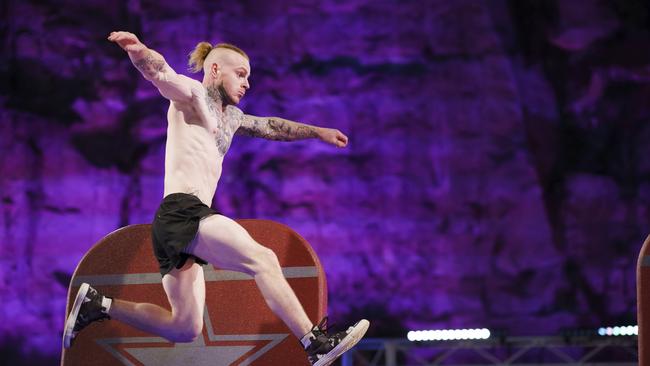 Party boy Corey Worthington competes in the 2018 season of Australian Ninja Warrior. Picture: Channel 9