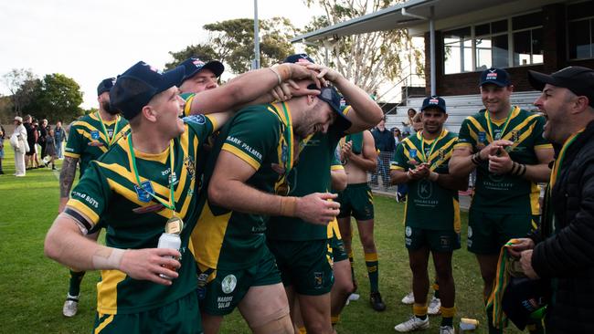 The Hornets players celebrating after a famous grand final victory. Photo: Elise Derwin