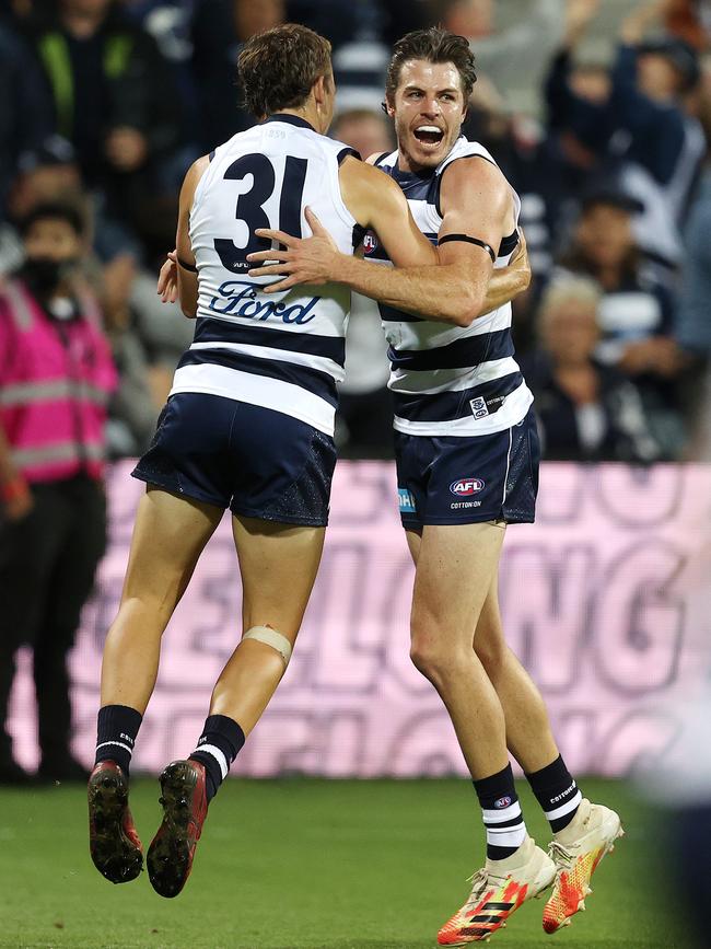 Isaac Smith celebrates with debutant Francis Evans after kicking the match-winning goal. Picture: Michael Klein