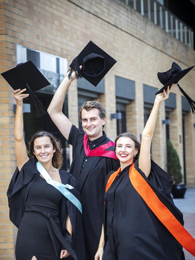 UTAS graduations at Hobart, (L-R) Lauren Wiggins, Thomas Bailey and Jessica Martin. Picture Chris Kidd