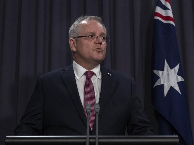 Prime Minister Scott Morrison said public gatherings should now be reduced to two people and announced a move to ban rental evictions. Picture: Gary Ramage