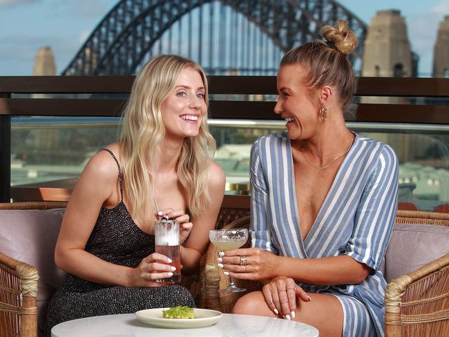 Lauren Ferguson and Nicci Crisp enjoying a cocktail at Henry Deane, Hotel Palisade, Millers Point. Picture: Justin Lloyd