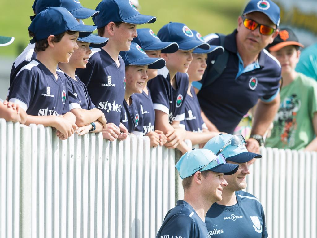 Steve Smith and Shane Watson pose for photos at Manly.