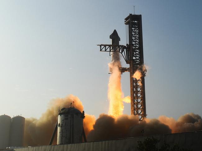 Starship lifts off from the launch pad. Picture: Patrick T. Fallon/AFP