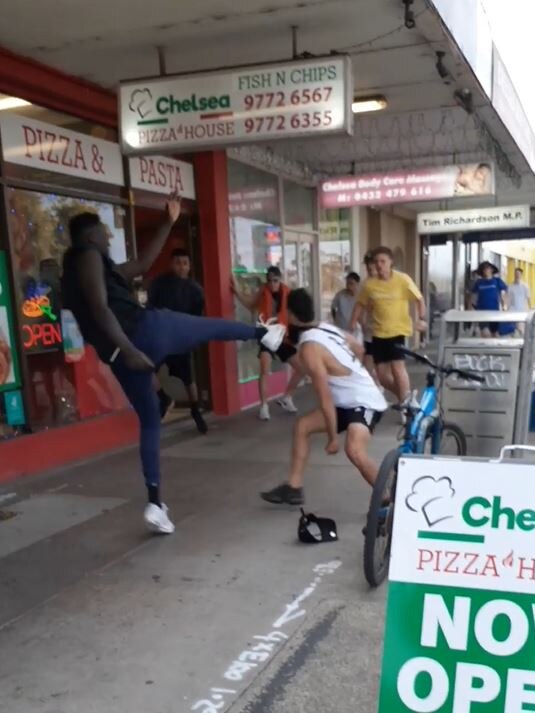 A youth tries to kick another young person during a Chelsea brawl earlier this week. Picture: Facebook