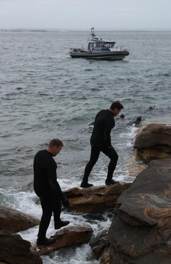 Police search rocks early today. Picture John Grainger