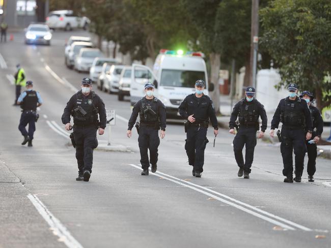 Officers in Dulwich Hill last week. Picture: Richard Dobson