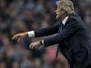 Manchester City manager Manuel Pellegrini gestures from the touchline as his team are beaten 2-0 by Newcastle during the English League Cup soccer match between Manchester City and Newcastle at the Etihad Stadium, Manchester, England, Wednesday Oct. 29, 2014. (AP Photo/Jon Super)