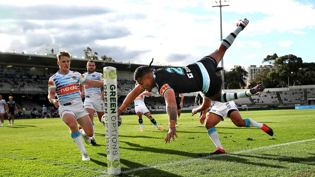 Cronulla's Sione Katoa attempts a diving try in the corner but can't quite get it down during the NRL match between the Cronulla Sharks and Gold Coast Titans at Kogarah oval. Picture. Phil Hillyard