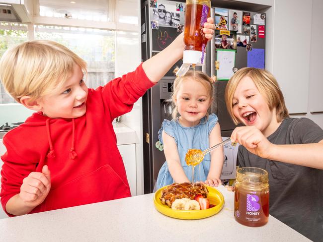 Young consumers taste-test Bega’s new B honey. Picture: Jake Nowakowski