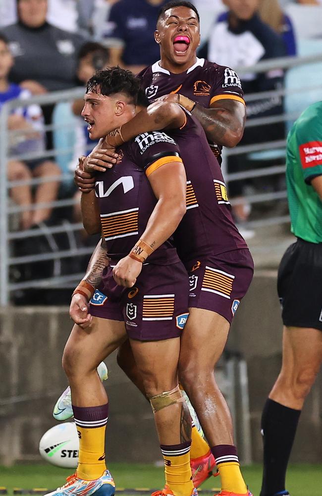 Kotoni Staggs celebrates with teammates after scoring a try. Picture: Mark Kolbe/Getty Images