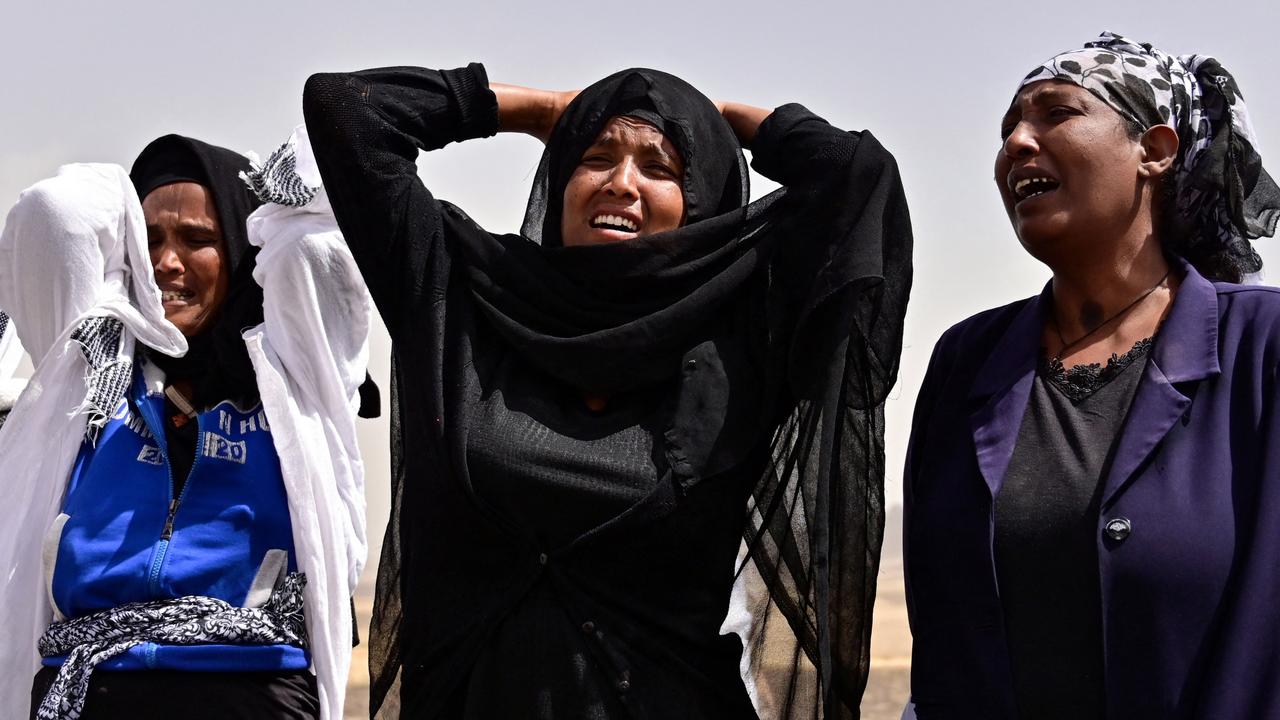 Distraught relatives at the Ethiopian Airlines crash site. Picture: Tony Karumba/AFP