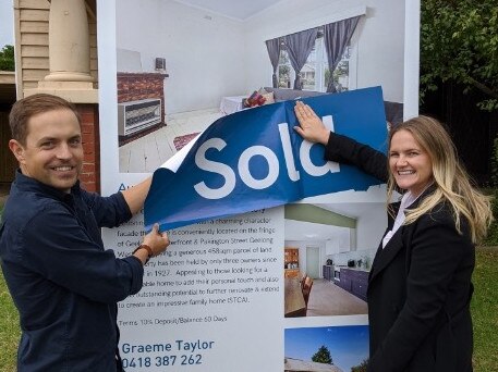 The new owners of 12 Stubbs Ave, North Geelong after Saturday's auction.