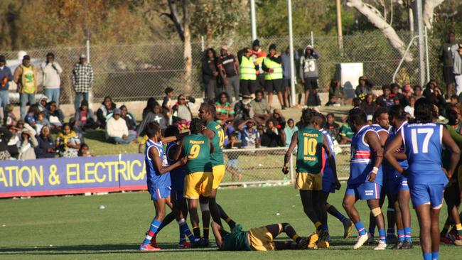 Drama erupts at the CAFL Community League grand finals 2021. Papunya v Western Aranda. Picture: Lee Robinson.