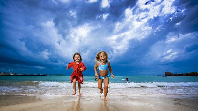 Minnie Scott, 4 and Lexi Colebert, 3, on the beach at Currumbin Alley. Picture: Nigel Hallett