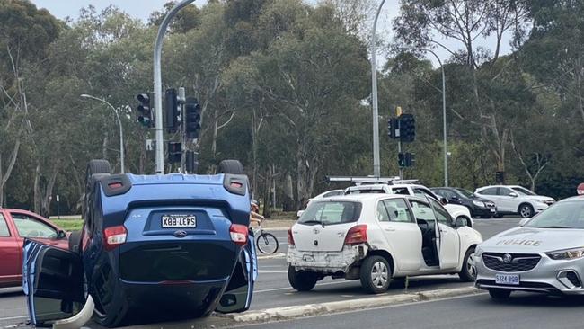 A car has flipped in a crash on Unley Rd this afternoon. Picture: 9 News