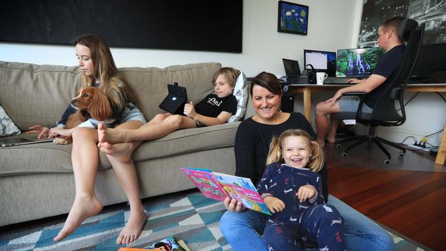 Jennifer and Chris Eaton with youngest daughter Emily, 3, and school-age children Charlotte, 10, and Tim, 8, who will be studying at their Sydney home. Picture: John Feder