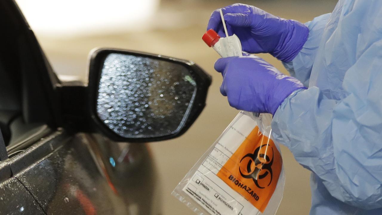 A nurse at a drive up coronavirus testing station, set up by the University of Washington Medical Center. Picture: AP/Ted S. Warren