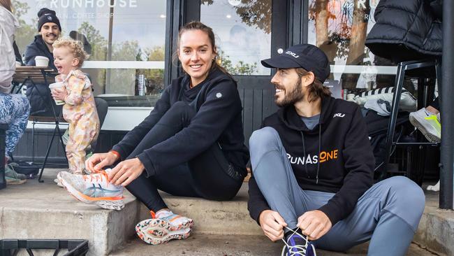 Izzi Batt-Doyle and elite runner Riley Cocks at the Runhouse cafe they run in Norwood. .Picture: Tom Huntley