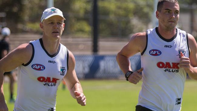 Port Adelaide’s midfield strategies are sharper with the pairing of Robbie Gray, left, and Brisbane recruit Tom Rockliff. Picture: Ben Macmahon (AAP)