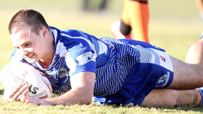 Tugun Seahawks (blue) vs. Southport Tigers at Tugun. A Grade. Zac Beecher scoring a try. 6 June 2021 Tugun Picture by Richard Gosling