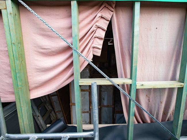 The view into the construction site is not any better for neighbours. Picture: Julian Andrews