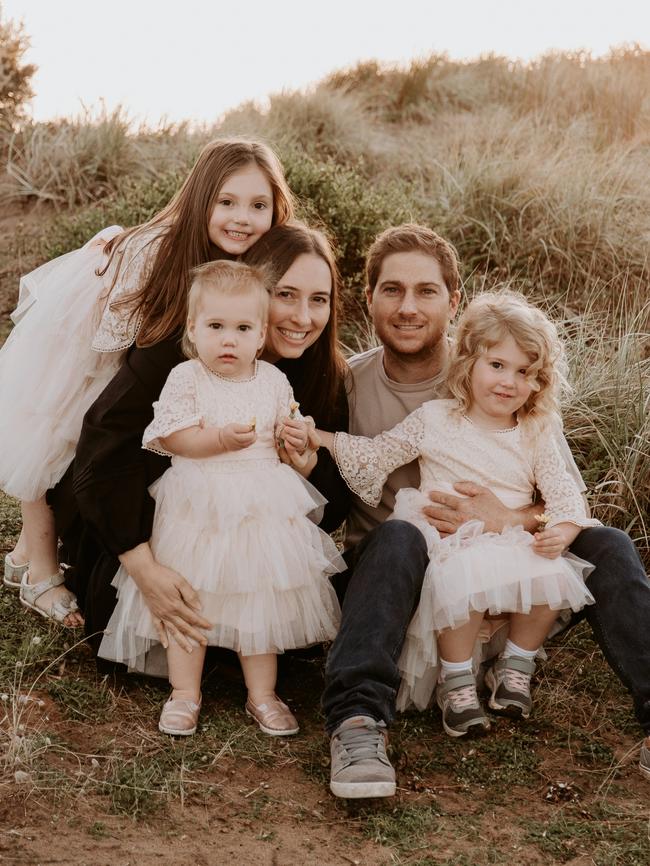 Father-of-three Russell Cranwell, 36, with his wife Rachael and daughters Ashton, Hallie and Josie. Picture: Wildfields Photography