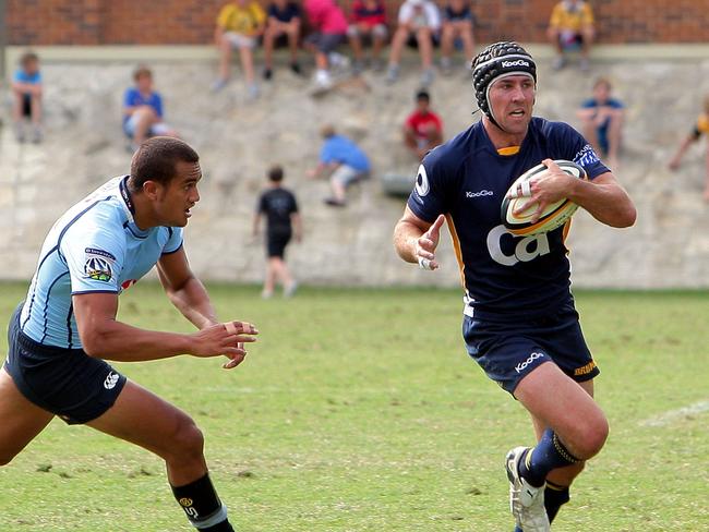 Julian Huxley in action on the rugby field.