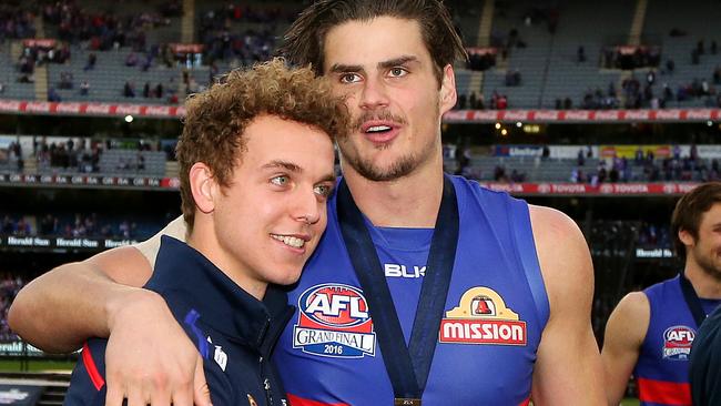 Tom Boyd celebrates with injured teammate Mitch Wallis. Picture: Mark Stewart