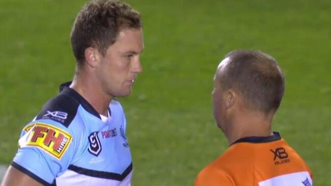 Moylan is attended to by the Sharks trainer after copping a hit from Sam Burgess. Credit: Fox Sports