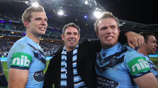 SYDNEY, AUSTRALIA - JULY 10:  Blues coach Brad Fittler celebrates with Tom Trbojevic of the Blues and Jake Trbojevic of the Blues after winning game three of the 2019 State of Origin series between the New South Wales Blues and the Queensland Maroons at ANZ Stadium on July 10, 2019 in Sydney, Australia. (Photo by Cameron Spencer/Getty Images)