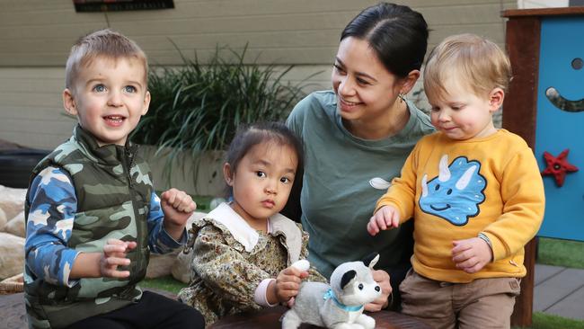 Early childhood teacher Shannyn Block – with Sebastian Matic, Demi Hunt and Jensen Harris Cumming – knows “a lot of people who love working in early childhood but end up leaving”. Picture: John Feder/The Australian