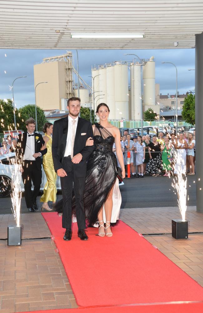 Toowoomba school formals. At the 2023 St Ursula's College formal is graduate Ella Maher with her partner. Picture: Rhylea Millar