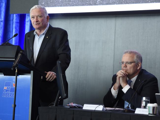 Prime Minister Scott Morrison, right, listens to Nick Greiner's speech during the Tasmanian State Liberal Party Conference in Devonport. Picture: AAP